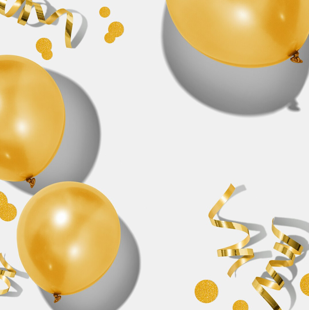 Festive party with golden confetti and lights