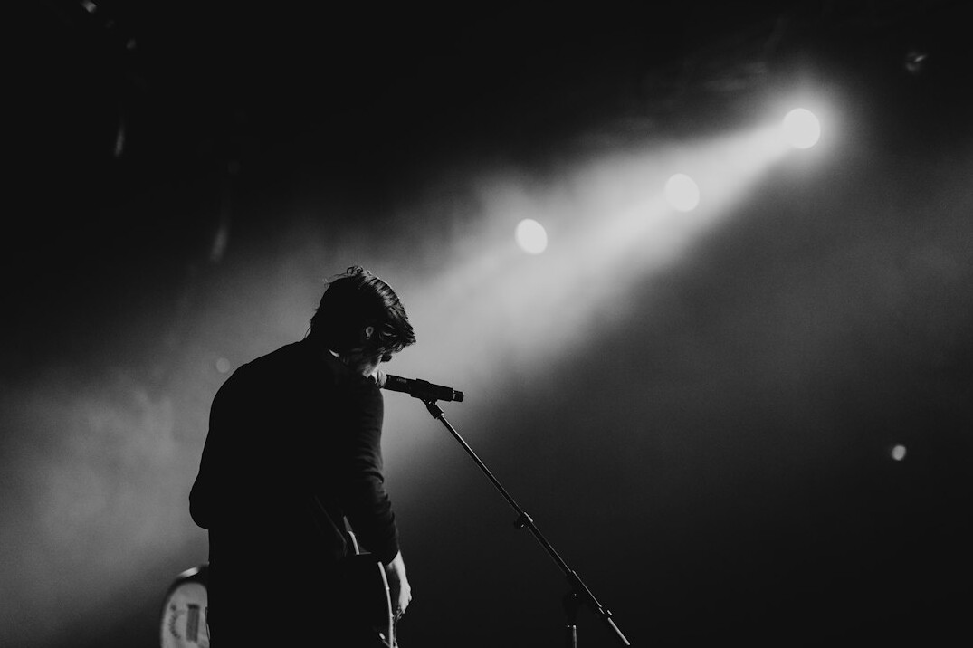 singer performing on stage